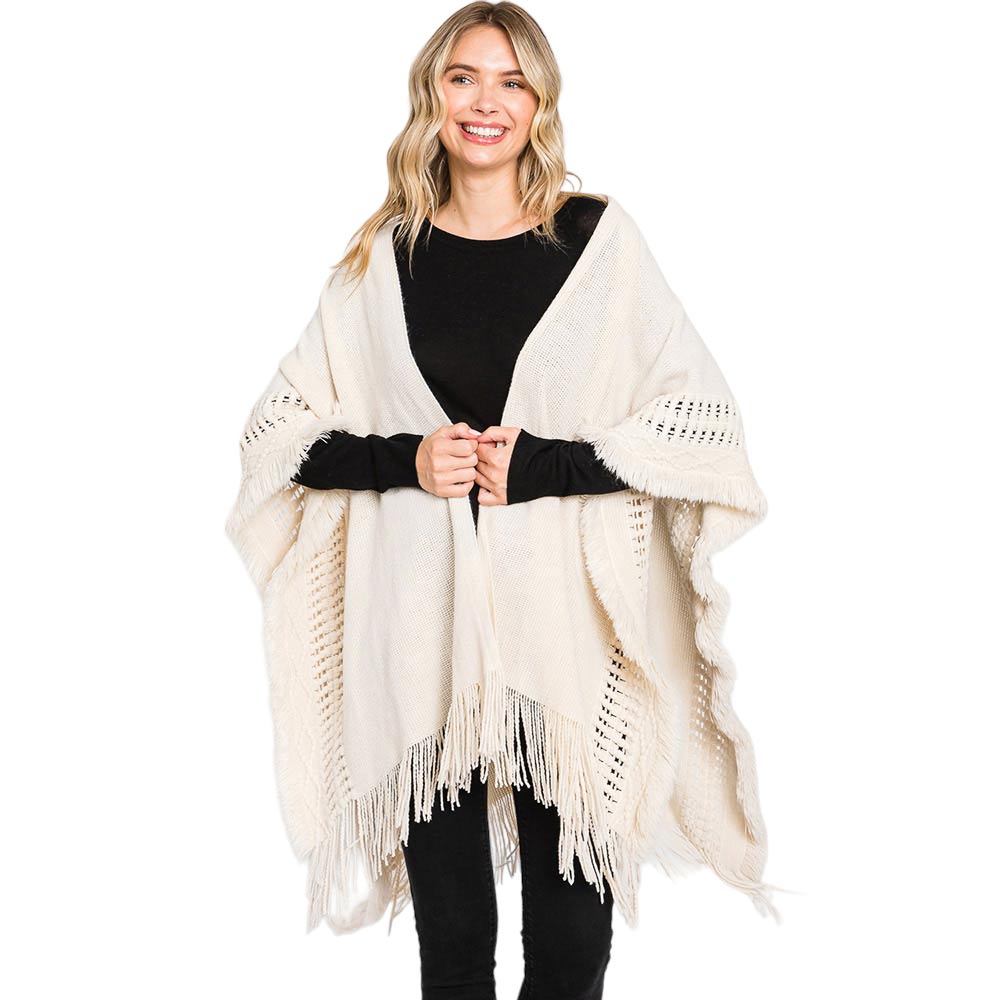 Ivory Fringe Cut Out Knit Ruana Poncho, with the latest trend in ladies' outfit cover-up! the high-quality knit poncho is soft, comfortable, and warm but lightweight. It's perfect for your daily, casual, party, evening, vacation, and other special events outfits. A fantastic gift for your friends or family.