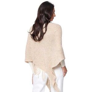 Ivory Fringed Solid Knit Poncho, with the latest trend in ladies' outfit cover-up! the high-quality knit poncho is soft, comfortable, and warm but lightweight. It's perfect for your daily, casual, party, vacation, and other special events outfits. A fantastic gift for your friends or family.