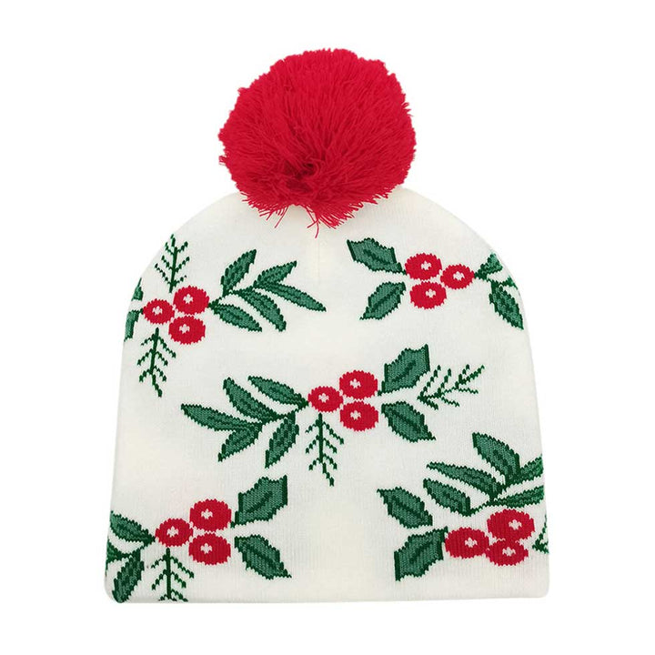 Ivory Mistletoe Pom Pom Beanie Hat. You'll love the classic look of the hat. Its cozy design combines style and comfort for a winter-ready look. Made with high-quality materials, this beanie is soft. Enjoy the festive look of the mistletoe pom pom, perfect for the winter season. Ideal gift item for any winter occasion.