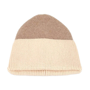 Ivory Neutral Two Tone Cuff Beanie Hat, is perfect for any occasion. Featuring a two-tone design and made from a soft acrylic blend material, this beanie will keep you feeling comfortable and looking chic. The cuff adds a modern flair, making this hat the perfect choice for everyday wear. Perfect winter gift idea. 