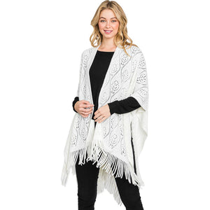 Ivory Patterned Fringe Ruana Poncho, with the latest trend in ladies' outfit cover-up! the high-quality knit ruana poncho is soft, comfortable, and warm but lightweight. It's perfect for your daily, casual, party, evening, vacation, and other special events outfits. A fantastic gift for your friends or family.