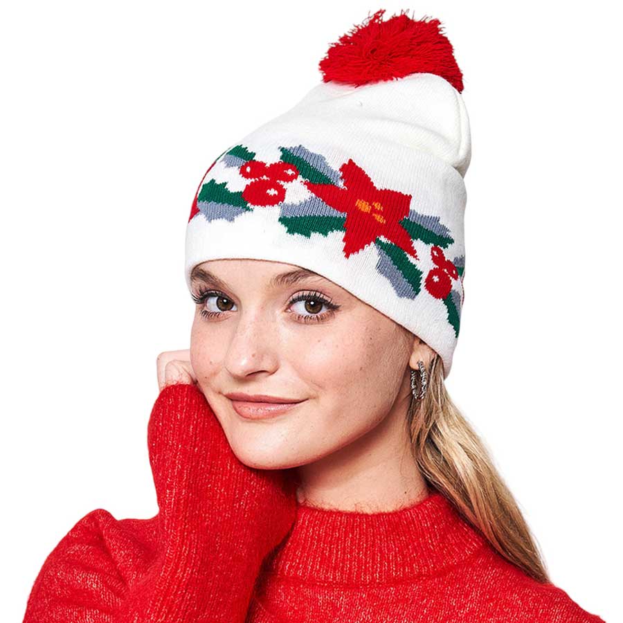 Ivory Poinsettia Flower Pom Pom Beanie Hat, is the perfect winter accessory! Crafted with a unique poinsettia flower pattern. This hat will keep you comfortable and stylish in the colder months. Get ready to look fashionable and stay warm in this. Indefectible gift item on Christmas days for your loved ones or to yourself.
