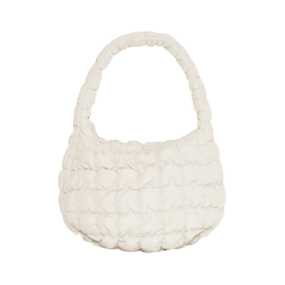 Ivory Quilted Puffer Tote Shoulder Bag, Stay warm and stylish with this bag. Made of durable material, it is insulated to keep you cozy in the coldest conditions. The shoulder straps make it comfortable and convenient to carry, so you can bring everything you need with ease. Perfect for gifting on every occasion.
