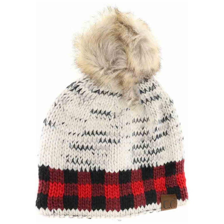 ivory red Buffalo Check Mixed Print Fur Pom C.C Beanie combines timeless style with modern detail for superior winter wear. Crafted with a mix of classic buffalo check and complementary prints, this beanie offers visual depth and versatility. The plush faux fur pom adds both warmth and a refined finishing touch. Made with a soft, stretchable knit, it ensures a snug, comfortable fit that effectively shields against chilly conditions. Ideal for those seeking a blend of traditional patterns and contemporary co