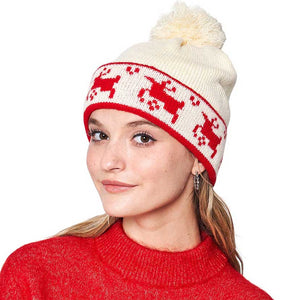Ivory Reindeer Holiday Pom Pom Beanie Hat, is the ideal accessory to complete your winter wardrobe in this Christmas. It features a comfortable ribbed knit construction, with a decorative reindeer design and a festive pom-pom topper. Keep your head warm and stay stylish in this. Perfect winter season festival gift idea.