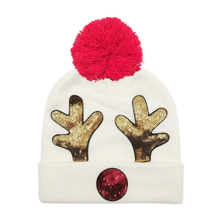 Ivory Sequin Embellished Rudolph Pom Pom Beanie Hat is the perfect addition to any winter wardrobe. Crafted from soft fabric and featuring a Rudolph design with sequin detailing, this hat provides warmth, comfort, and style. Gift it to anyone in your life for a functional and fashionable accessory.