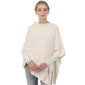 Ivory Solid Poncho, with the latest trend in ladies' outfit cover-up! the high-quality knit solid poncho is soft, comfortable, and warm but lightweight. It's perfect for your daily, casual, party, evening, vacation, and other special events outfits. A fantastic gift for your friends or family.