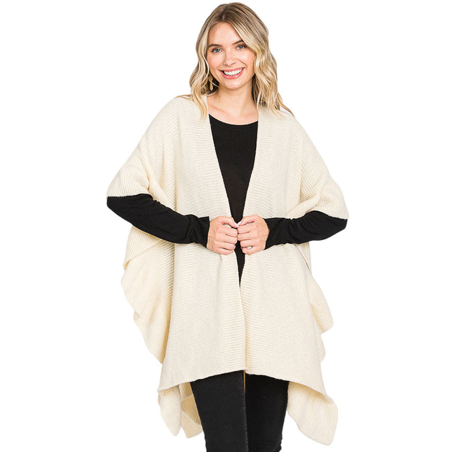 Ivory Solid Ruffle Knit Ruana Poncho, with the latest trend in ladies' outfit cover-up! the high-quality knit ruana poncho is soft, comfortable, and warm but lightweight. It's perfect for your daily, casual, party, vacation, and other special events outfits. A fantastic gift for your friends or family.