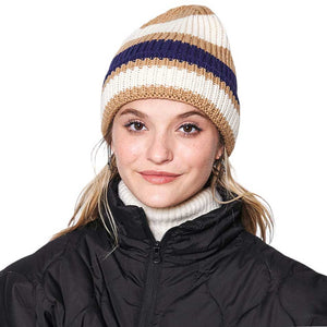 Ivory Striped Cuff Beanie Hat, is a perfect accessory for the colder months. Crafted from acrylic and polyester materials, this beanie provides maximum warmth without compromising on style. Its unique striped cuff design ensures comfort and a standout look. Stay warm and look stylish with the Striped Cuff Beanie Hat.