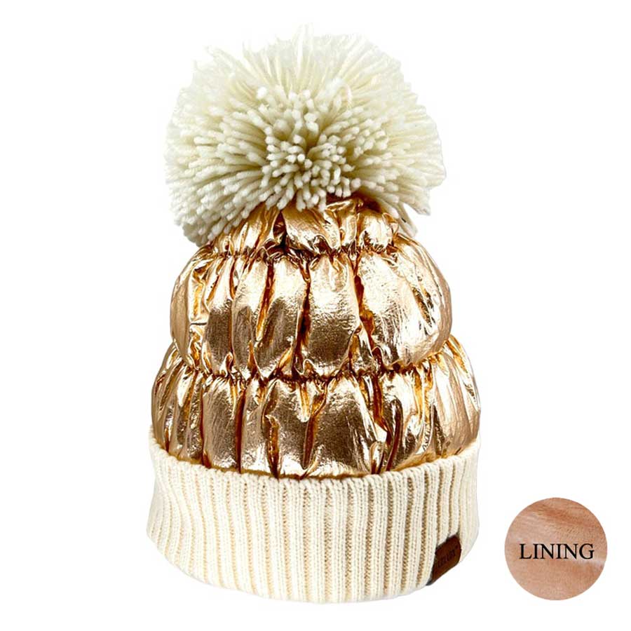 Ivory Puffer Knit Pom Pom Glossy Winter Cozy Beanie Hat. Before running out the door into the cool air, you’ll want to reach for this toasty beanie to keep you incredibly warm. Accessorize the fun way with this puffer knit hat, it's the autumnal touch you need to finish your outfit in style. Awesome winter gift accessory!