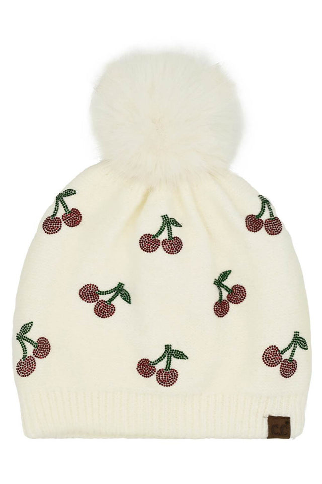 Ivory C.C Rhinestone Cherry Pattern Pom Beanie Hat sparkles with playful cherry motifs and rhinestone accents, finished with a fluffy pom for a fun, winter-ready look. Designed with a soft stretch fit, it delivers cozy warmth while adding a touch of glam to your cold-weather outfits.