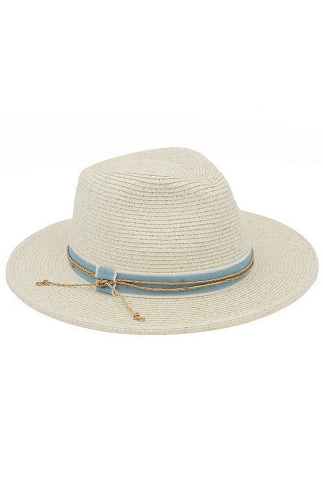 Ivory Elevate your sun style with this classic straw fedora, crafted from a breathable 80% paper and 20% polyester blend. The sophisticated contrast ribbon paired with intricate braided cord detailing adds a refined touch to any warm-weather outfit. Built-in UPF 50+ protection shields your face and neck from harmful rays, making it as practical as it is fashionable. Perfect for beach days, garden parties, or casual outings. Lightweight and comfortable for all-day wear. 