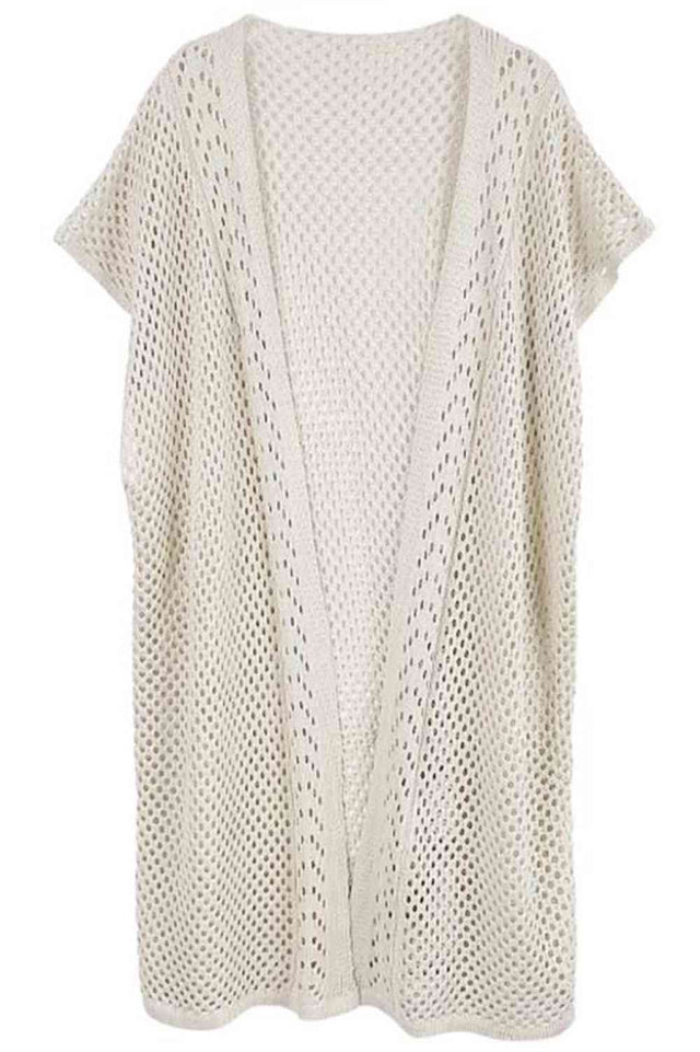 Ivory Effortless elegance meets modern comfort with this Mesh Solid Kimono. Crafted from lightweight 100% polyester, this versatile piece features a breathable mesh construction perfect for layering or wearing solo. With generous dimensions of 38.6" x 27.6", it drapes beautifully over any outfit, adding instant sophistication to casual or dressed-up looks. The solid design ensures easy pairing with your existing wardrobe.