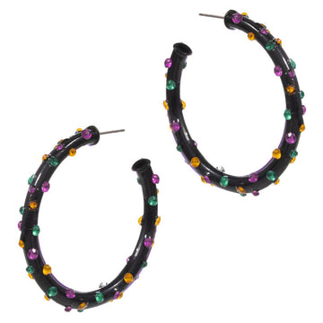 Jet Black Statement hoop earrings featuring a bold, sculpted silhouette accented with raised stud details for eye-catching texture and dimension. Designed to stand out while remaining comfortable to wear, these hoops elevate everyday outfits, party looks, and trend-forward styling for boutique accessory collections.