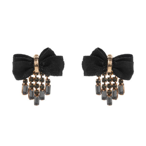 Jet Black Rhinestone Fringe Bow Earrings, Add a touch of glamour to your outfit with these fringe rhinestone earrings. The sparkling rhinestones catch the light for a dazzling effect, while the elegant bow design adds a touch of femininity. Perfect for a special occasion or to elevate your everyday style.