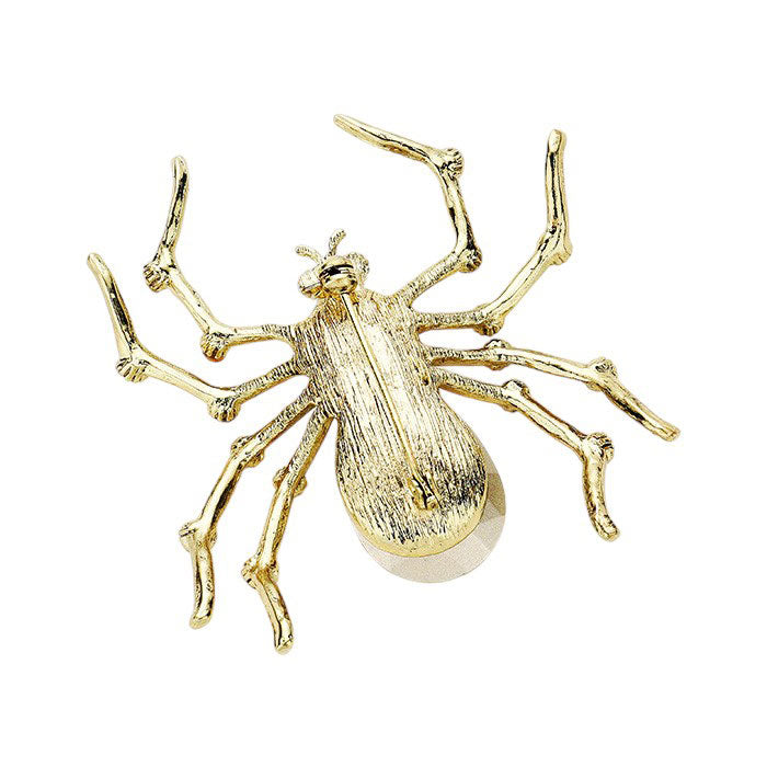 Crystal Spider Pin Brooch is crafted with sparkling crystals, adding a touch of sophistication to any outfit. The intricate design and attention to detail make it a must-have for any accessory collection. Elevate your style with this stunning brooch.