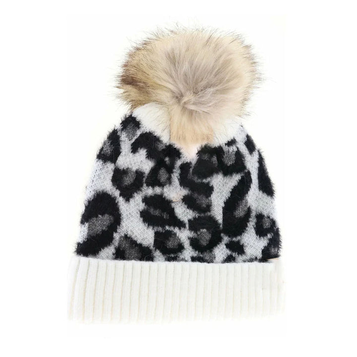 Ivory KIDS Leopard Pom C.C Beanie combines playful design with practical warmth, featuring a soft pom-pom and a trendy leopard print. Designed to fit comfortably on children’s heads, it offers reliable insulation for cooler weather while maintaining durability for everyday wear. This beanie is an expert choice for parents seeking both style and function in their child’s winter accessories. 
