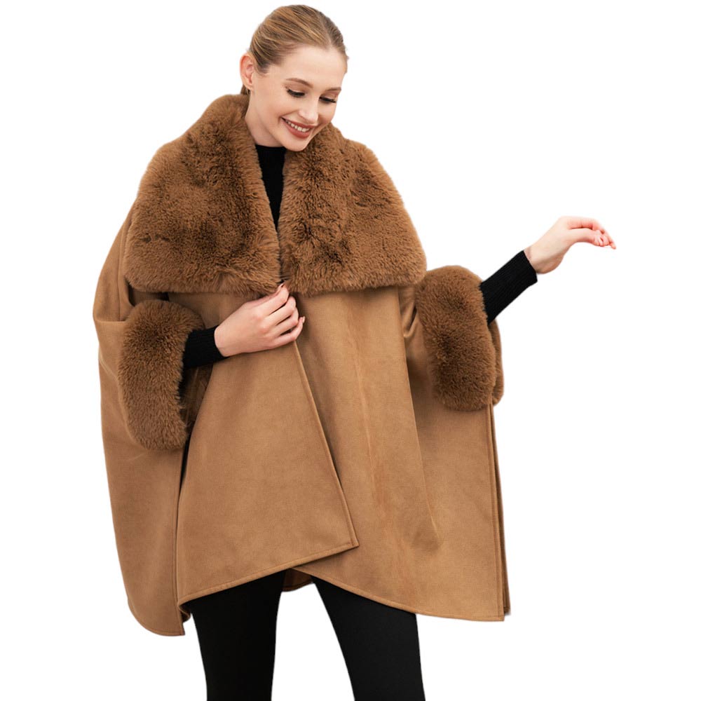 Khaki Faux Fur Trimmed Solid Ruana Poncho. Crafted with a faux fur-trimmed and a smooth fabric, this poncho gives you the perfect cold-weather accessory. Layer over your favorite outfits and stay warm and stylish. Give the perfect winter gift to your family members, friends, loved ones, or yourself with this stylish poncho.