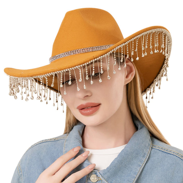 Khaki Rhinestone Band with Pointed Stones Paved Cowboy Western Hat features a stylish Rhinestone Band with Pointed Stones, adding a touch of glamour to your outfit. The paving of the stones adds a subtle sparkle and shine, making this hat perfect for a day out on the ranch or a night on the town. Elevate your Western style with this fashionable and versatile accessory. 