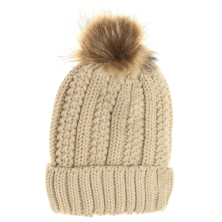 Beige Kids Fuzzy Lined Fur Pom CC Beanie offers superior warmth and comfort with its soft, fuzzy lining designed specifically for children. Its durable construction ensures long-lasting wear, while the stylish fur pom adds a fashionable accent. Ideal for cold weather, this beanie provides expert-level protection and cozy insulation, making it a practical and trendy accessory for your child’s winter wardrobe.