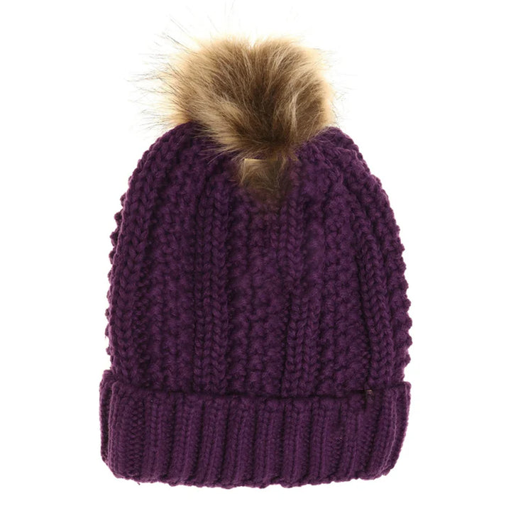 Dark-Purple Kids Fuzzy Lined Fur Pom CC Beanie offers superior warmth and comfort with its soft, fuzzy lining designed specifically for children. Its durable construction ensures long-lasting wear, while the stylish fur pom adds a fashionable accent. Ideal for cold weather, this beanie provides expert-level protection and cozy insulation, making it a practical and trendy accessory for your child’s winter wardrobe.