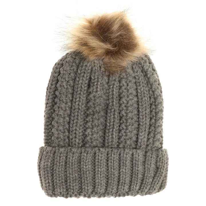 Light-Grey Kids Fuzzy Lined Fur Pom CC Beanie offers superior warmth and comfort with its soft, fuzzy lining designed specifically for children. Its durable construction ensures long-lasting wear, while the stylish fur pom adds a fashionable accent. Ideal for cold weather, this beanie provides expert-level protection and cozy insulation, making it a practical and trendy accessory for your child’s winter wardrobe.