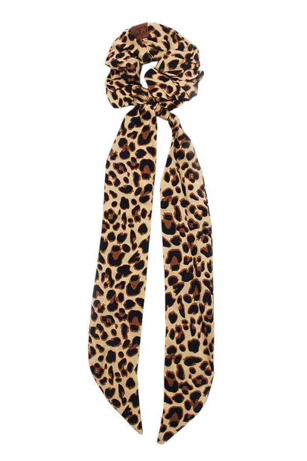 Leopard C.C. LEOPARD SASH SCRUNCHIES are the perfect addition to any hair accessories collection. Made from high-quality materials, these scrunchies feature a stylish leopard print design and include a sash for added flair. Elevate your hairstyle with these fashionable and versatile scrunchies.