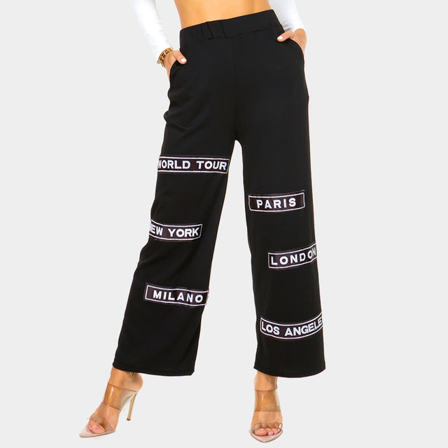 Madeline Love Black City Name Printed Pants - Apparel