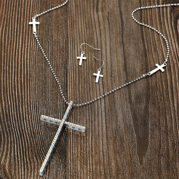 Madeline Love AB, Silver Burnished Star Shaped Punched Stone Paved Cross Pendant Long Necklace - Necklaces