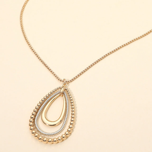 Madeline Love Gold, Two Tone Metal Bubble Layered Teardrop Pendant Long Necklace - Necklaces