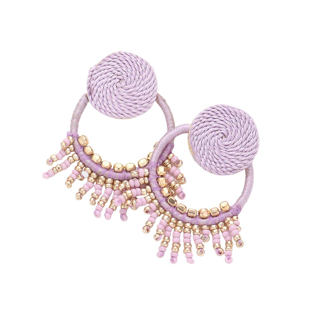 Lavender Rope Wrapped Beaded Fringe Open Circle Earrings, are fun handcrafted jewelry that fits your lifestyle, adding a pop of pretty color. Highlight your appearance, and grasp everyone's eye at your party. These are Great gifts idea for your Wife, Mom, your Loving one, or family member.