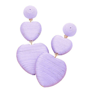 Lavender Thread Wrapped Double Heart Dropdown Earrings are a versatile and stylish addition to any jewelry collection. The unique design features two intertwined hearts, symbolizing love and unity. Crafted with high-quality materials, these earrings are lightweight and comfortable to wear. Perfect for any occasion or daily wear