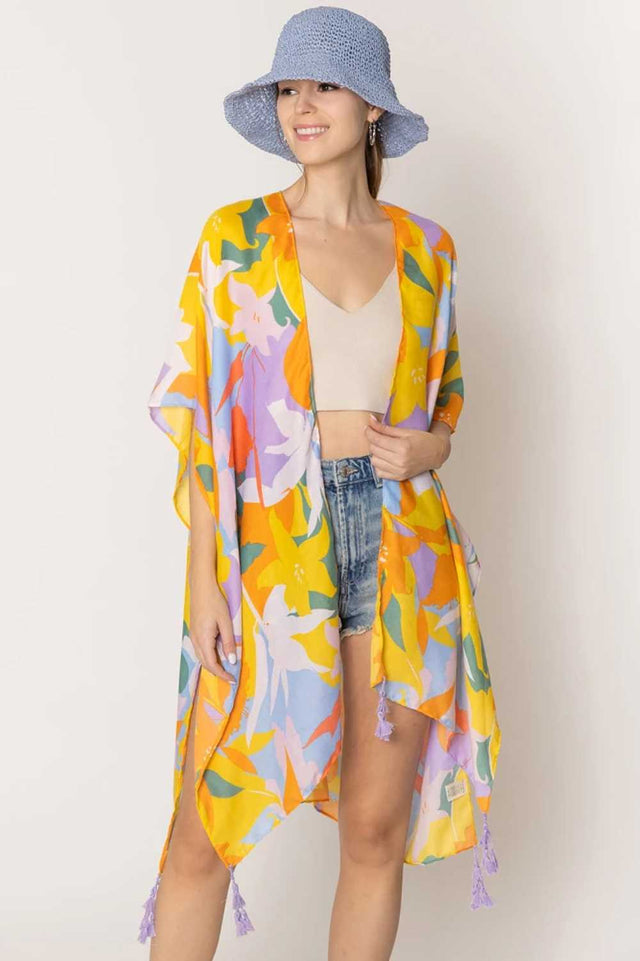 Lavender Embrace effortless elegance with this stunning Floral Print Tassel Kimono. Crafted from lightweight 100% polyester, this versatile piece features a beautiful floral design and charming tassel details that add movement and dimension. With generous dimensions of 35.4" x 35.4", it drapes beautifully over any outfit, perfect for layering during warmer months or as a beach cover-up.