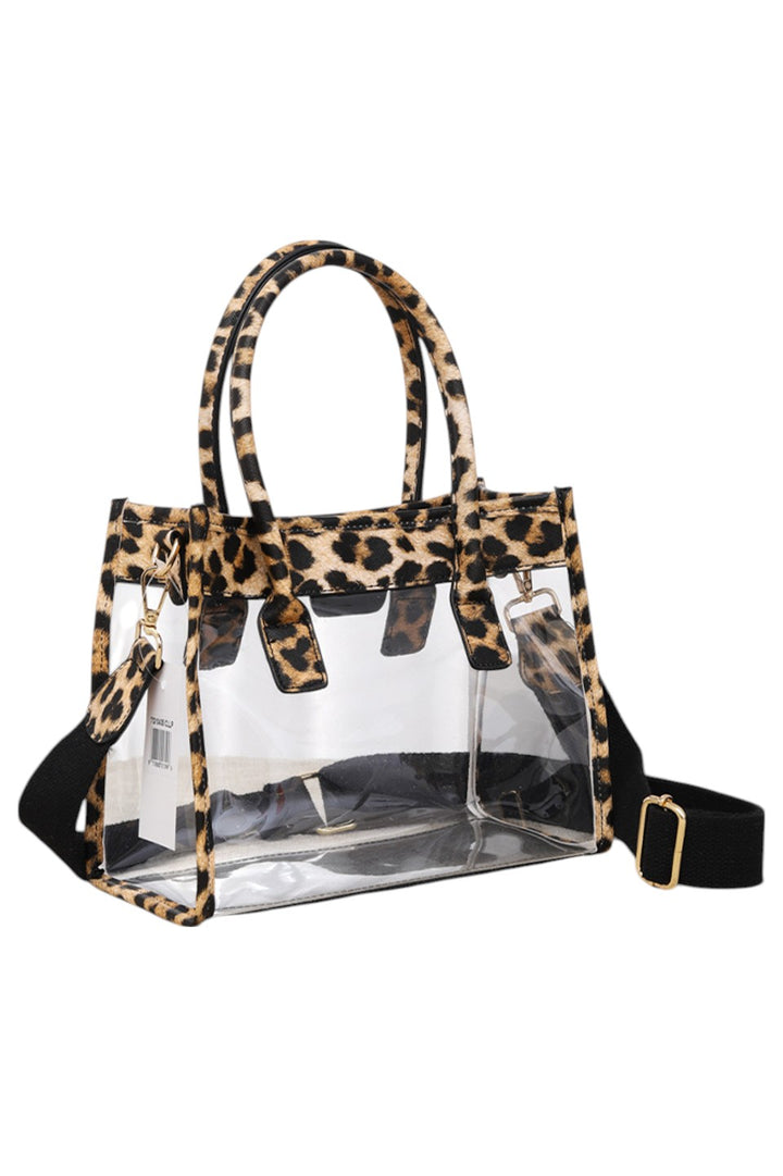 Color Trim Clear Hand Bag combines modern transparency with vibrant accents, offering a stylish yet practical accessory. Its clear design allows easy visibility of contents, while the colorful trim adds a fashionable touch. Lightweight and spacious, it’s ideal for daily use or events requiring quick access to essentials without sacrificing style. Durable materials ensure long-lasting wear, making it a smart choice for those who value both function and trend. 