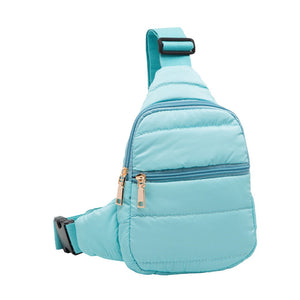 Light Blue Solid Puffer Mini Sling Bag, be the ultimate fashionista while carrying this Solid Puffer Sling bag in style. It's great for carrying small and handy things. Keep your keys handy & ready for opening doors as soon as you arrive. The adjustable lightweight features room to carry what you need for long walks or trips.
