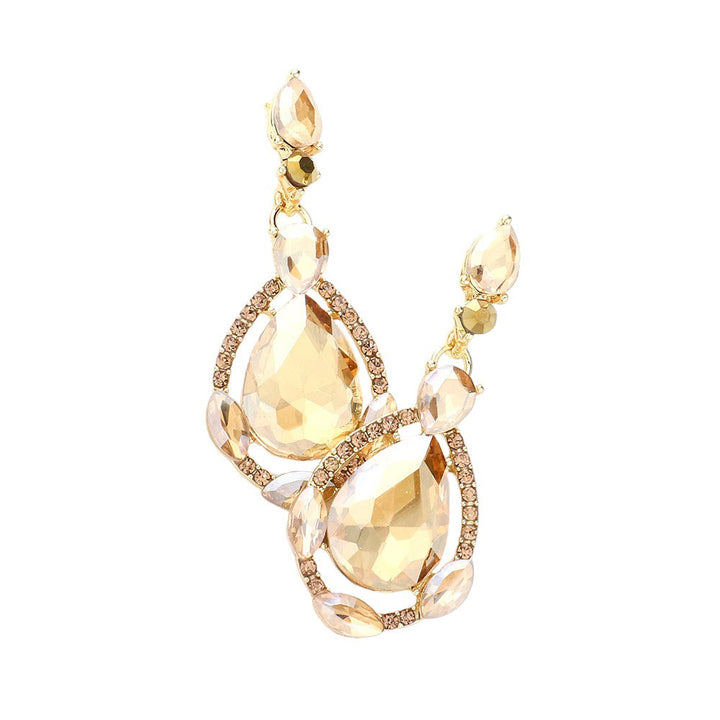 Light Col Topaz Crystal Rhinestone Teardrop Evening Earrings, are beautifully crafted with glimmering crystal rhinestones and a teardrop design that adds elegance and charm to your look. They are the perfect accessory for adding a touch of glamour to any special occasion. A quintessential gift choice for loved ones on any special day.