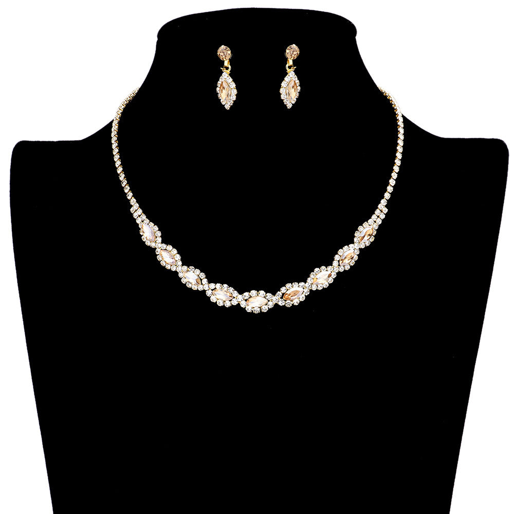 Gold Marquise Stone Accented Rhinestone Jewelry Set, adds a classic touch to any ensemble. The timeless marquise cut stones are perfectly accented with a dazzling variety of rhinestones, creating a timeless piece of jewelry that is sure to impress. A perfect fashion accessory for any kind of casual or special occasion.