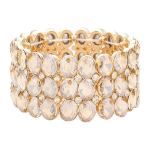 Light Col Topaz Oval Stone Cluster Stretch Evening Bracelet, This beautiful bracelet features an elegant design with 14K rose gold plated accents and center stones for a stunning, eye-catching look. Enjoy the comfort of the elasticized fit and the glamour of special occasions. Perfect for your next formal event or evening out.