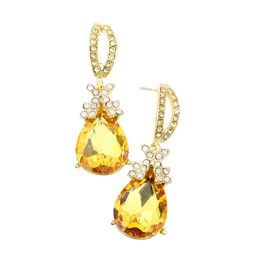Light Col Topaz Teardrop Crystal Rhinestone Evening Earrings, are the perfect accessory for any special occasion. Each earring features a teardrop-shaped crystal encrusted in rhinestones for a glamorous sparkle and shine. High-quality stones are set securely in the design. A timeless gift piece that will sparkle for years.