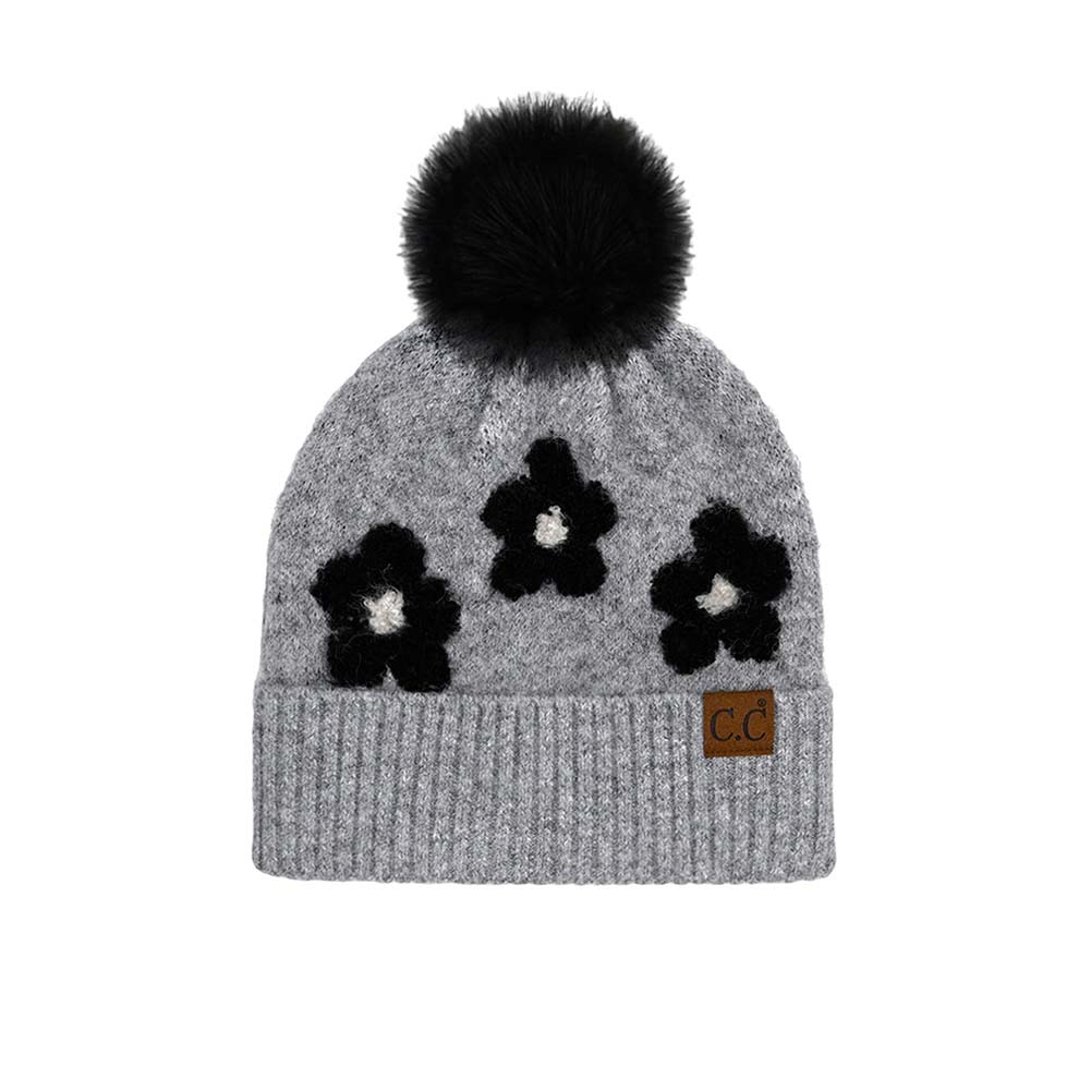 Light Gray C.C Daisy Pattern Beanie with Pom, stay warm and fashionable in this cozy, stylish beanie with pom. It's soft and warm and made from yarn for superior comfort. The playful pom accent adds a delightful touch of fun to any outfit. Awesome winter gift accessory for birthdays, Christmas, anniversaries, and family.