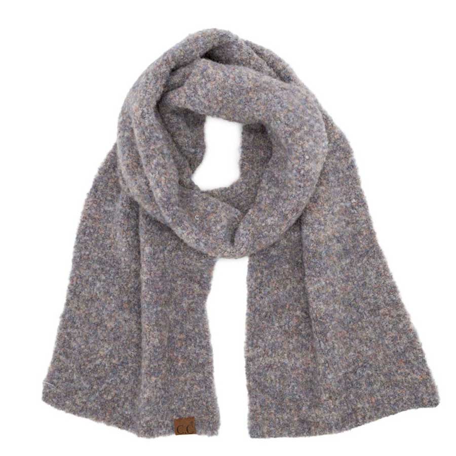 Light Gary C.C Mixed Color Boucle Scarf, is crafted from a luxurious blend of soft acrylic and wool materials. A fashionable accessory for any wardrobe, Its stylish looped texture features multicolored accents, providing a unique and eye-catching look. The scarf's lightweight design ensures comfort and warmth all season long.