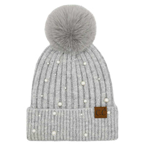 Light Gray C.C Pearl Embellishments Pom Pom Beanie Hat, this stylish beanie is made from high-quality material for a comfortable and snug fit. Featuring pearl embellishments and a pom pom detail, this hat is sure to keep you looking stylish and chic in chilly weather. Perfect winter gift for friends and family.