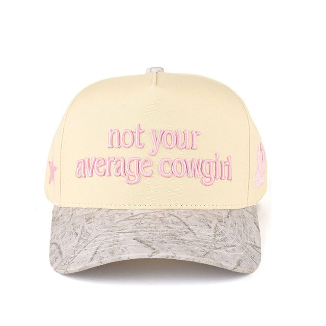 Light Pink CC Beanie “Not Your Average Cowgirl” Lettering Two-Tone Trucker Baseball Snapback Cap features bold embroidered lettering with a stylish two-tone design for a standout western-inspired look. The classic trucker silhouette with a snapback closure provides breathable comfort and an adjustable fit for all-day wear.