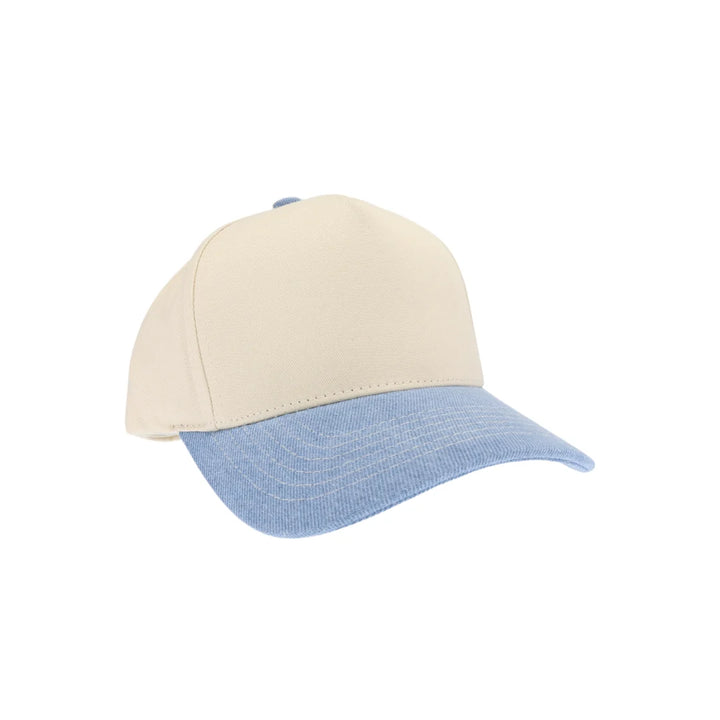 LightDenim  KIDS Two Tone Canvas C.C Trucker Hat combines durable canvas with breathable mesh for comfort and style. Its two-tone design adds a playful touch, while the adjustable snapback ensures a secure fit for growing heads. Perfect for everyday wear, this hat offers sun protection and a trendy look for active kids. 