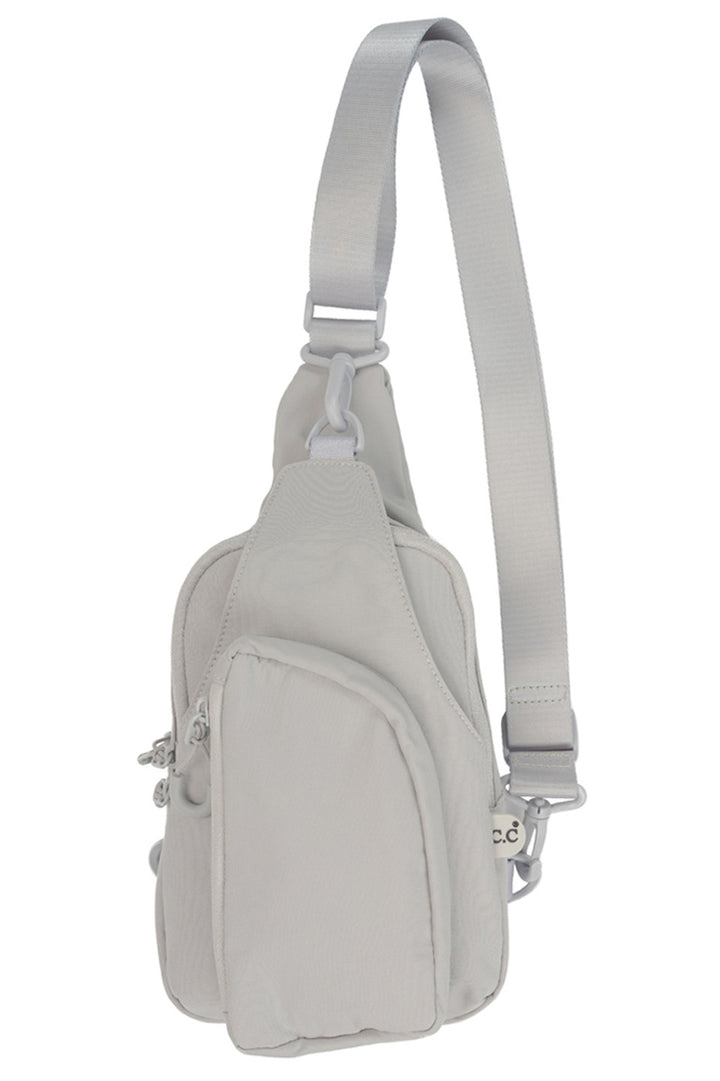 LightGray C.C Solid Crossbody Sling Bag is a stylish and versatile accessory for any outfit. Its durable design and multiple compartments make it perfect for storing all your essentials, while its crossbody strap allows for hands-free convenience. Stay organized and fashionable with this must-have bag.