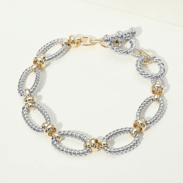 Madeline Love Two Tone 14K Gold Plated Two Tone Textured Oval Link Toggle Bracelet