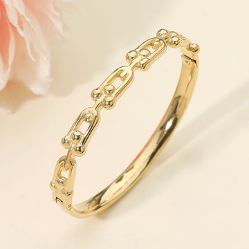 Madeline Love Gold Stainless Steel Industrial Link Hinged Bangle Bracelet - Bracelets