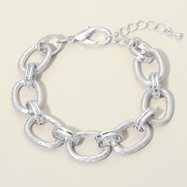 Madeline Love Worn Silver Textured Metal Oval Link Chain Bracelet - Bracelets