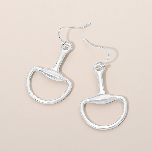 Madeline Love Silver Metal Half Horsebit Drop Earrings