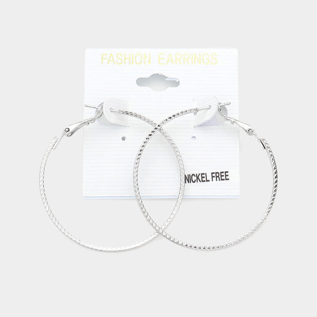 Madeline Love Silver 1.75 Inch Metal Hoop Earrings